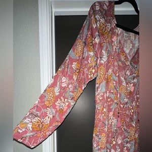 Beautiful floral maxi dress with long sleeves. Never worn.
